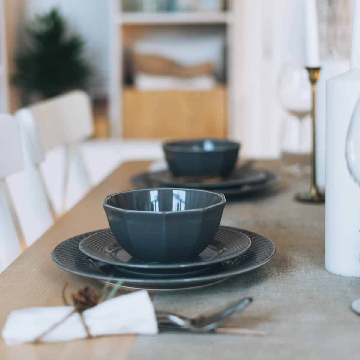 Serving festive table, grey plates, minimalism, scandinavian design at living room
